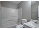 Bathroom with a white sink, toilet, and bathtub at 3673 Jervis Ct, Rex, GA 30273
