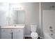 Clean bathroom features tiled shower, sink, vanity and toilet at 3673 Jervis Ct, Rex, GA 30273