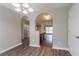 Lovely dining room featuring dark wood floors and access to kitchen at 3673 Jervis Ct, Rex, GA 30273