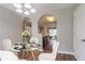 Cozy dining room with glass table and views of living spaces at 3673 Jervis Ct, Rex, GA 30273