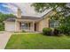Charming single-Gathering home with a quaint front porch and well-maintained lawn at 3673 Jervis Ct, Rex, GA 30273