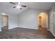 A bright living room has an arched entry into the other rooms at 3673 Jervis Ct, Rex, GA 30273