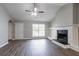 Spacious living room with vaulted ceiling and contemporary fireplace for easy living at 3673 Jervis Ct, Rex, GA 30273