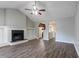 Spacious living room boasts a fireplace, hardwood floors, and an open floor plan at 3673 Jervis Ct, Rex, GA 30273