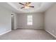 Spacious main bedroom with soft carpet and bright, neutral walls at 3673 Jervis Ct, Rex, GA 30273
