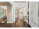 Welcoming foyer featuring hardwood floors, high ceilings, and a view of the dining and living areas at 4266 Suwanee Brook Ct, Buford, GA 30518