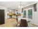 Bright eat-in kitchen with stainless steel appliances and granite countertops at 4266 Suwanee Brook Ct, Buford, GA 30518