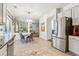 Bright kitchen with a dining area and modern appliances, plus backyard view at 4266 Suwanee Brook Ct, Buford, GA 30518