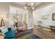 Spacious living space with hardwood floors, showcasing the dining area and foyer in an open-concept design at 4266 Suwanee Brook Ct, Buford, GA 30518
