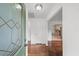Entryway featuring hardwood floors, a leaded glass door, and access to the kitchen at 2045 Sherwood Se Dr, Marietta, GA 30067
