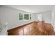 Spacious room featuring hardwood floors and large windows at 2045 Sherwood Se Dr, Marietta, GA 30067