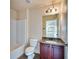 Cozy bathroom with granite vanity, bathtub, and toilet at 3642 Lake Estates Way Way, Atlanta, GA 30349