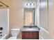 Bathroom with a granite vanity top and tiled shower and tub combination at 3642 Lake Estates Way Way, Atlanta, GA 30349