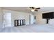 Spacious main bedroom with walk-in closet and wall mounted TV at 3642 Lake Estates Way Way, Atlanta, GA 30349