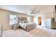 Luxurious main bedroom with elegant furnishings and ensuite bathroom access at 3642 Lake Estates Way Way, Atlanta, GA 30349