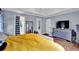 Bright bedroom with an ensuite bathroom, walk-in closet, and large windows at 3897 Tanbark Ct, Marietta, GA 30066