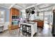 Beautiful kitchen with stainless steel appliances, granite countertops, central island and tile floor at 3897 Tanbark Ct, Marietta, GA 30066