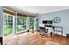Bright office featuring hardwood floors, neutral wall paint, and large window to view the yard at 3897 Tanbark Ct, Marietta, GA 30066