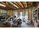 Unfinished basement with exposed beams and exterior view at 414 Wallis Farm Way, Marietta, GA 30064