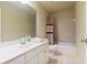 Standard bathroom with a shower/tub combination and a white single sink vanity at 414 Wallis Farm Way, Marietta, GA 30064
