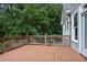 Large wooden deck overlooks wooded backyard at 414 Wallis Farm Way, Marietta, GA 30064