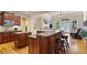 Spacious kitchen with a large island, stainless steel appliances, and bar seating, great for entertaining at 414 Wallis Farm Way, Marietta, GA 30064