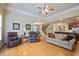 Inviting living room with hardwood floors and neutral tones, perfect for relaxing and entertaining guests at 414 Wallis Farm Way, Marietta, GA 30064