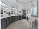 Elegant bathroom with dual sinks, gray cabinetry, and a separate shower and tub at 570 Society St, Alpharetta, GA 30022