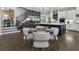 Bright dining area featuring a glass table, modern chairs, and stylish wallpaper at 570 Society St, Alpharetta, GA 30022