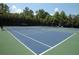 Community tennis courts showcasing well-maintained courts with surrounding landscaping at 570 Society St, Alpharetta, GA 30022
