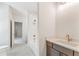 Bathroom with a modern vanity, quartz countertops, shower stall, and soaking tub at 675 Crest Line Trl, Powder Springs, GA 30127