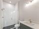 Modern bathroom with a glass-enclosed shower, stylish vanity, and sleek fixtures at 675 Crest Line Trl, Powder Springs, GA 30127