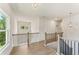 Bright hallway with hardwood floors and decorative lighting at 675 Crest Line Trl, Powder Springs, GA 30127