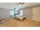 Cozy bedroom featuring a comfortable bed, neutral tones, and carpet, creating a welcoming space at 3040 Sandy Creek Ct, Loganville, GA 30052