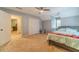 Serene bedroom featuring plush carpeting, a comfortable bed, and ample storage, creating a relaxing atmosphere at 3040 Sandy Creek Ct, Loganville, GA 30052