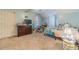 Bedroom with a large window, light blue walls, and a ceiling fan at 3040 Sandy Creek Ct, Loganville, GA 30052