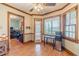Breakfast nook with natural light and view to the office space at 3040 Sandy Creek Ct, Loganville, GA 30052