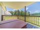 Hot tub on the rear deck, overlooking a large lawn and landscaping, for the ultimate outdoor escape at 3040 Sandy Creek Ct, Loganville, GA 30052