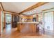 Kitchen with a center island, granite countertops, and modern appliances at 3040 Sandy Creek Ct, Loganville, GA 30052