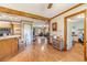 Open floor plan showcasing the living area connected to the kitchen and office space at 3040 Sandy Creek Ct, Loganville, GA 30052