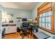 Comfortable office with natural light and built-in shelving at 3040 Sandy Creek Ct, Loganville, GA 30052
