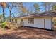 Exterior view of home, showcasing a wooden deck, siding and backyard at 3310 Bryan Way, Marietta, GA 30008