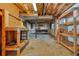 Unfinished basement with workbenches, exposed ceiling, and storage space at 3310 Bryan Way, Marietta, GA 30008