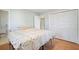 Bedroom featuring hardwood floors, access to the bathroom and a closet at 3310 Bryan Way, Marietta, GA 30008