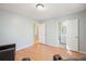 Bedroom featuring laminate flooring and ensuite bathroom access at 3310 Bryan Way, Marietta, GA 30008