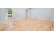 Spacious room with hardwood floors and a freshly painted neutral color palette at 3310 Bryan Way, Marietta, GA 30008