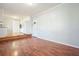 Open-concept living room featuring hardwood floors and easy access to the kitchen at 3310 Bryan Way, Marietta, GA 30008