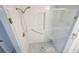 Bright, newly renovated shower with glass surround and built-in seat at 3310 Bryan Way, Marietta, GA 30008
