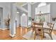 Spacious dining room featuring a wood table and chairs, high ceilings, and a decorative chandelier at 4119 Alayna Lee Cir, Mcdonough, GA 30252