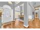 Elegant foyer with hardwood floors, a chandelier, and a decorative front door at 4119 Alayna Lee Cir, Mcdonough, GA 30252